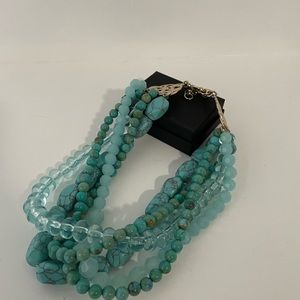 Turquoise colored beaded necklace